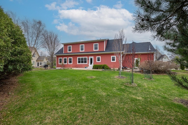 1213 Grey Fox Ave SW, Rochester, MN 55902 - rear view of property with entry steps and a lawn