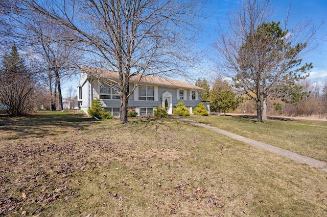 1601 5th Ave, Grand Rapids, MN 55744 - bi-level home featuring a front lawn