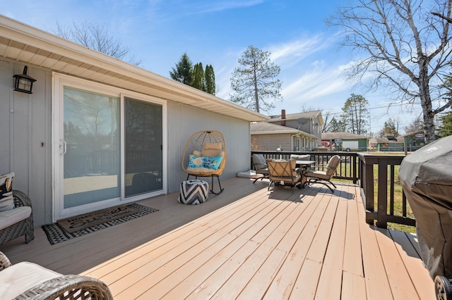 1601 5th Ave, Grand Rapids, MN 55744 - wooden deck with outdoor dining area