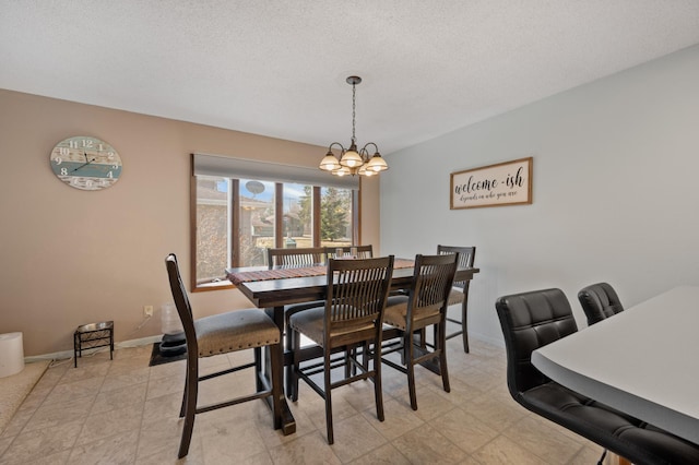 1601 5th Ave, Grand Rapids, MN 55744 - dining area with an inviting chandelier and baseboards