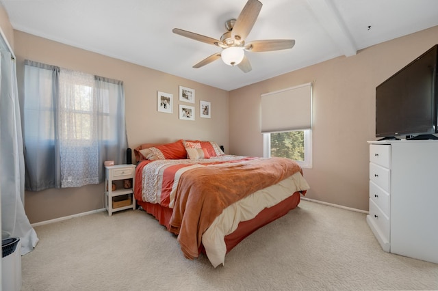 1601 5th Ave, Grand Rapids, MN 55744 - bedroom with light colored carpet, ceiling fan, and baseboards