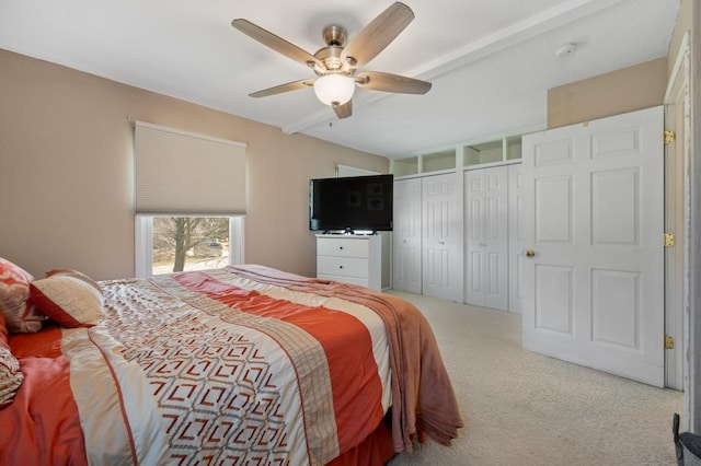 1601 5th Ave, Grand Rapids, MN 55744 - bedroom with carpet flooring, ceiling fan, and two closets