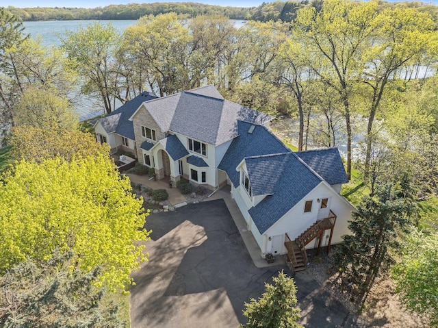 view of subject property with a nearby body of water
