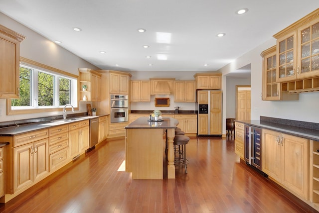 kitchen with stainless steel appliances, beverage cooler, open shelves, dark countertops, and recessed lighting