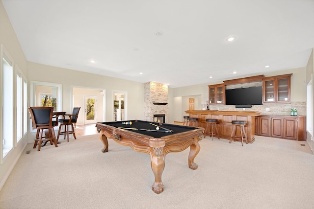 recreation room featuring wet bar, light carpet, billiards table, a fireplace, and recessed lighting