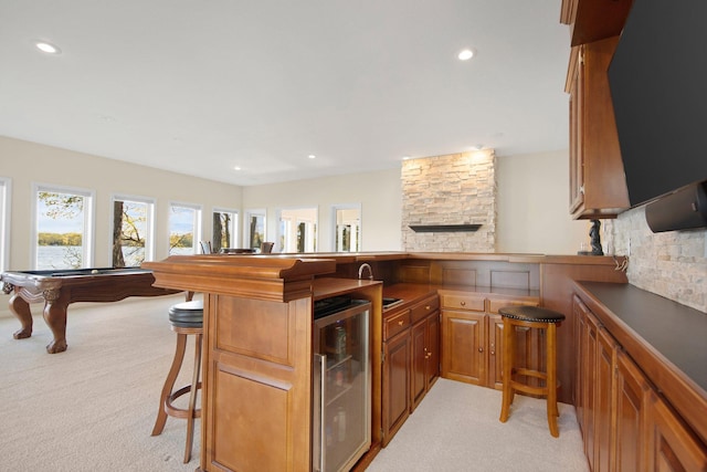 indoor dry bar featuring beverage cooler, light colored carpet, pool table, recessed lighting, and tasteful backsplash