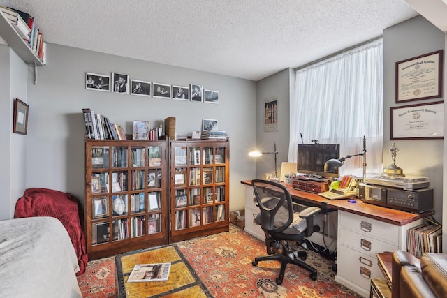 1425 28th St Unit 407, Minneapolis, MN 55408 - office space with a textured ceiling