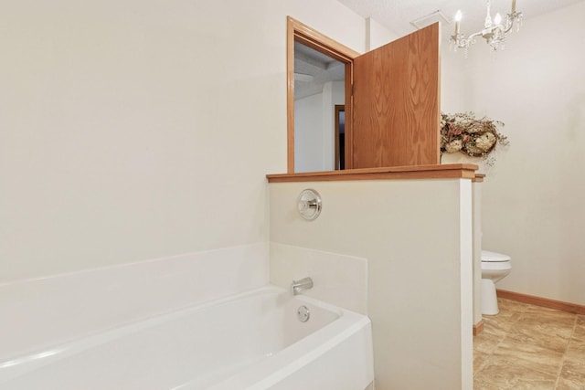 2499 Lockwood Dr Unit 61, Mendota Heights, MN 55120 - bathroom with a bath and a chandelier