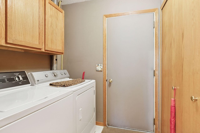 2499 Lockwood Dr Unit 61, Mendota Heights, MN 55120 - laundry area featuring separate washer and dryer and cabinet space