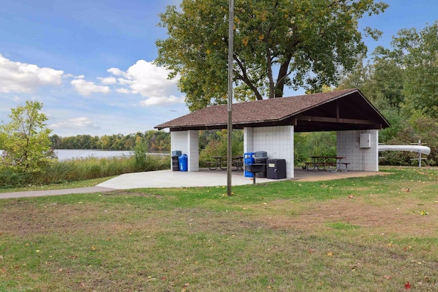 2499 Lockwood Dr Unit 61, Mendota Heights, MN 55120 - view of grassy yard with a water view and a patio