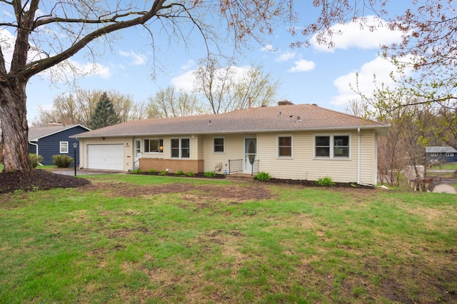 view of front of property with a chimney, a garage, driveway, and a front yard