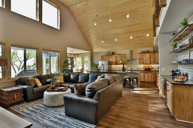 living area with high vaulted ceiling, wood ceiling, dark wood-style flooring, and recessed lighting