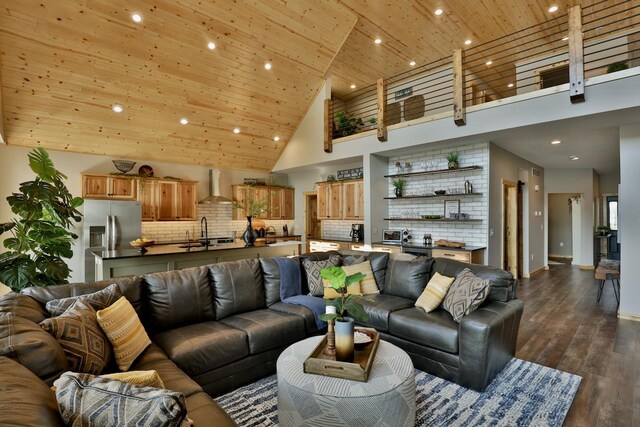 living room with wood ceiling, high vaulted ceiling, dark wood finished floors, recessed lighting, and baseboards