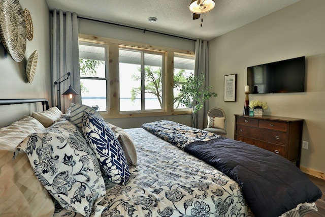 bedroom featuring wood finished floors