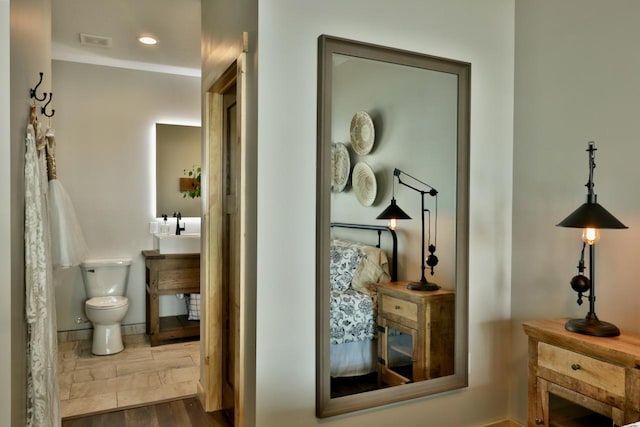 hall featuring dark wood-style flooring