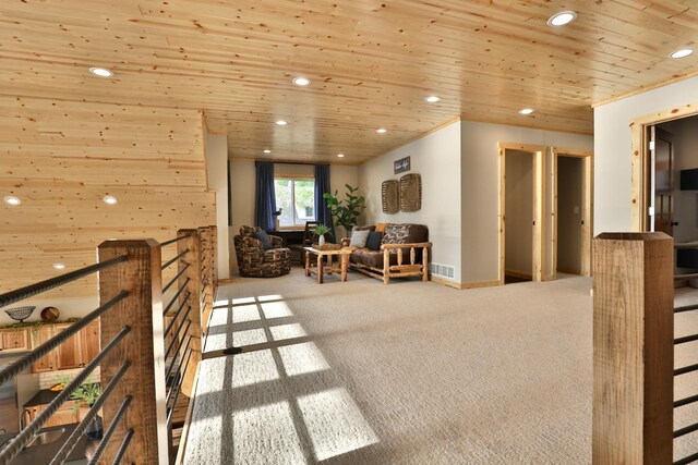living area with carpet flooring, recessed lighting, wooden ceiling, and baseboards
