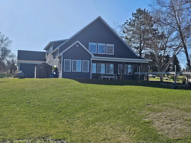 back of property featuring a lawn