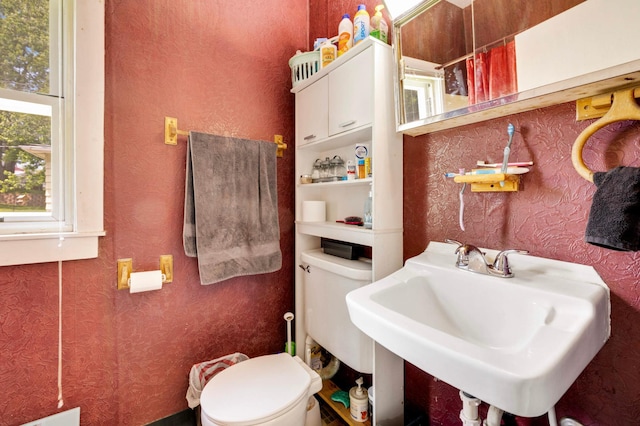 1102 Pacific St, Saint Paul, MN 55106 - bathroom featuring a sink and toilet