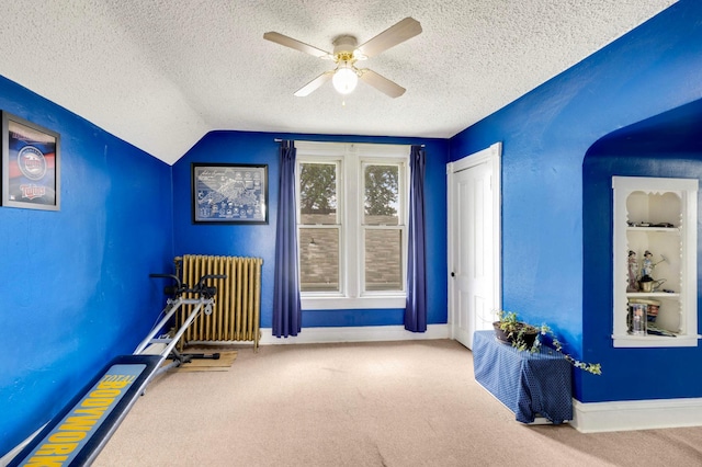 1102 Pacific St, Saint Paul, MN 55106 - game room featuring radiator, ceiling fan, a textured ceiling, carpet flooring, and baseboards