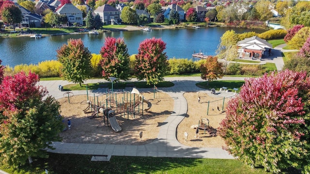 birds eye view of property featuring a residential view and a water view