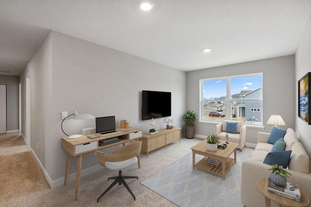 living area featuring baseboards, carpet flooring, and recessed lighting