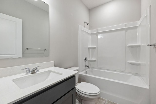 full bath featuring toilet, vanity, and bathing tub / shower combination
