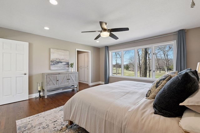 5610 Burl Oaks Ct, Minnetrista, MN 55364 - bedroom featuring dark wood-style floors, baseboards, a ceiling fan, and recessed lighting
