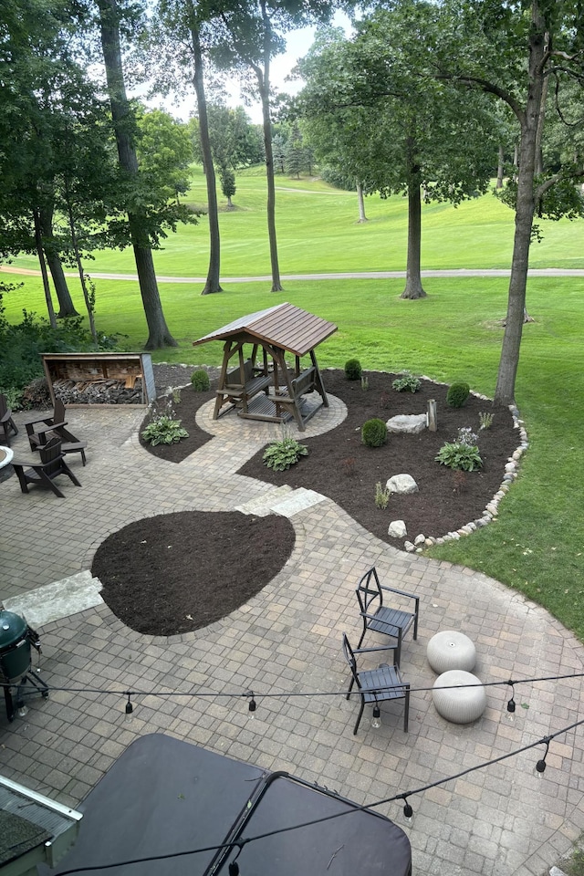 5610 Burl Oaks Ct, Minnetrista, MN 55364 - view of property's community featuring a patio and a yard