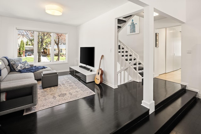 3710 Vincent Ave S, Minneapolis, MN 55410 - living area with stairs, wood finished floors, and baseboards