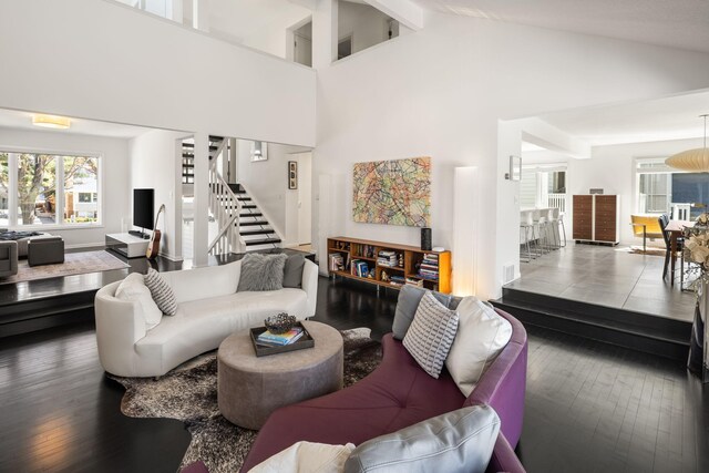 3710 Vincent Ave S, Minneapolis, MN 55410 - living room featuring hardwood / wood-style flooring, stairs, and high vaulted ceiling