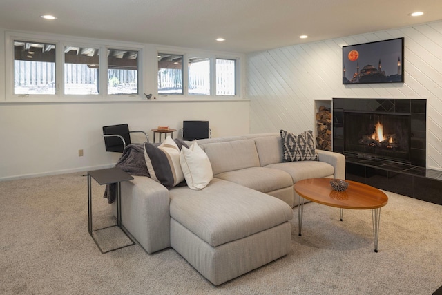 3710 Vincent Ave S, Minneapolis, MN 55410 - living area with carpet floors, recessed lighting, a tiled fireplace, and baseboards