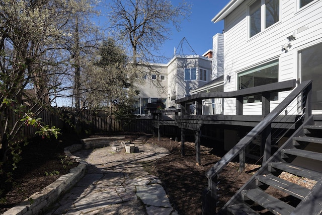 3710 Vincent Ave S, Minneapolis, MN 55410 - view of yard featuring stairs, a wooden deck, and fence