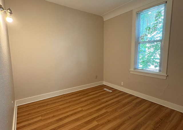 529 Blair Ave, Saint Paul, MN 55103 - unfurnished room with wood finished floors and baseboards