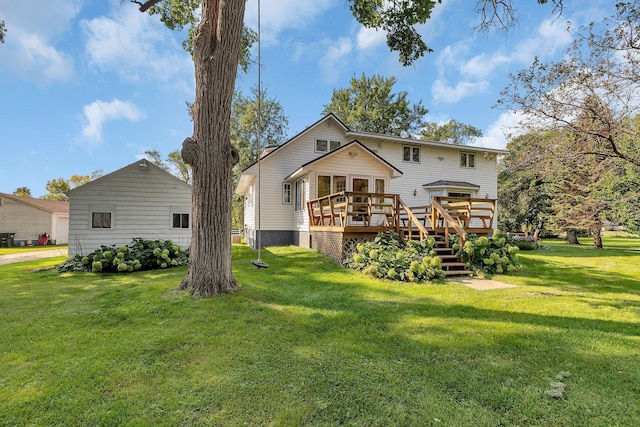 1205 Melvina Rd SW, Alexandria, MN 56308 - back of house featuring a lawn and a wooden deck
