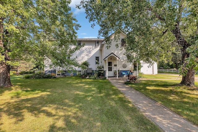 1205 Melvina Rd SW, Alexandria, MN 56308 - view of front of house featuring fence and a front yard