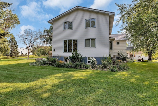 1205 Melvina Rd SW, Alexandria, MN 56308 - rear view of house featuring a yard and metal roof
