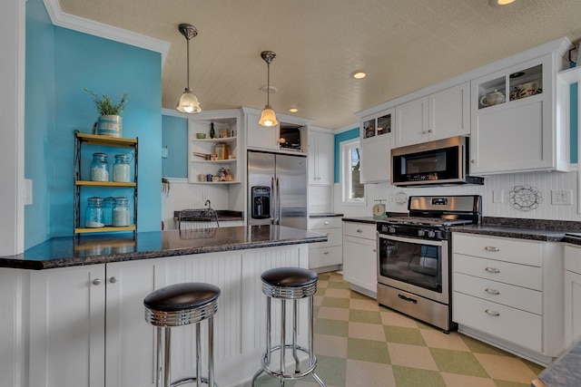 1205 Melvina Rd SW, Alexandria, MN 56308 - kitchen with open shelves, stainless steel appliances, decorative light fixtures, white cabinetry, and light floors