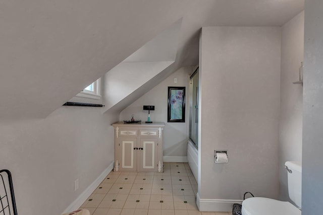 1205 Melvina Rd SW, Alexandria, MN 56308 - bathroom with baseboards, combined bath / shower with glass door, tile patterned flooring, and toilet