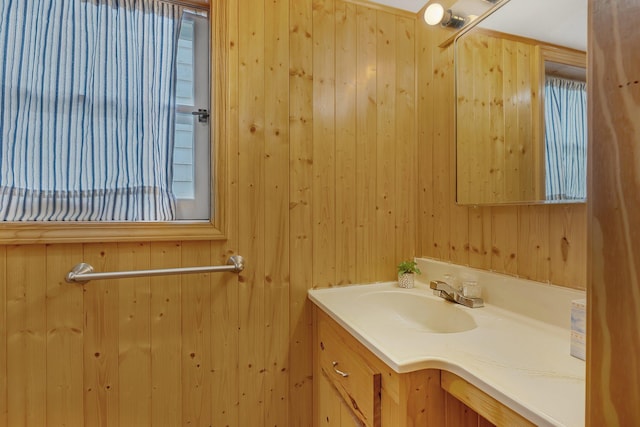 1205 Melvina Rd SW, Alexandria, MN 56308 - bathroom featuring vanity and wood walls