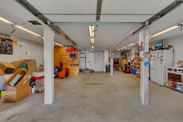 1205 Melvina Rd SW, Alexandria, MN 56308 - garage featuring a workshop area