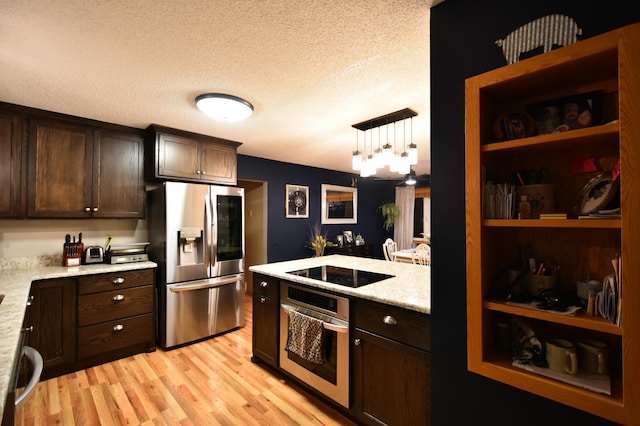1164 Hawthorn St, Red Wing, MN 55066 - kitchen featuring stainless steel appliances, dark brown cabinets, light wood-type flooring, and a textured ceiling