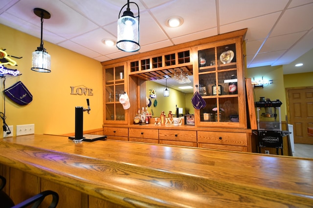 1164 Hawthorn St, Red Wing, MN 55066 - indoor dry bar featuring a paneled ceiling and hanging light fixtures