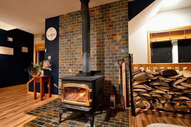 1164 Hawthorn St, Red Wing, MN 55066 - detailed view of a wood stove and wood finished floors