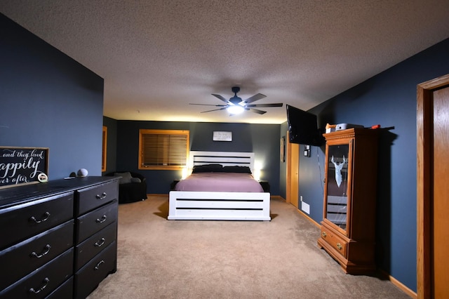 1164 Hawthorn St, Red Wing, MN 55066 - bedroom with carpet floors, a textured ceiling, and a ceiling fan