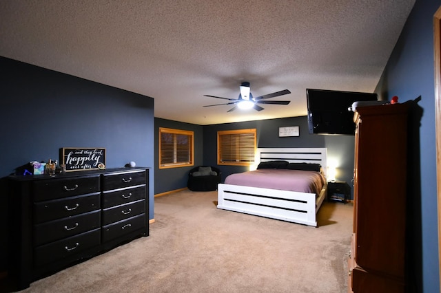 1164 Hawthorn St, Red Wing, MN 55066 - carpeted bedroom featuring a textured ceiling, ceiling fan, and baseboards
