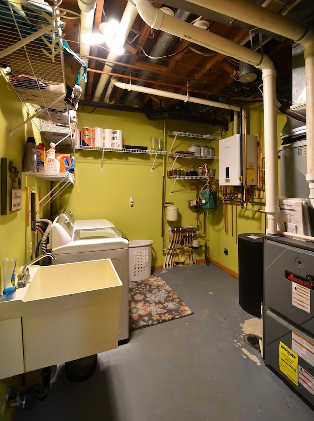 1164 Hawthorn St, Red Wing, MN 55066 - unfinished basement featuring independent washer and dryer, tankless water heater, and a sink