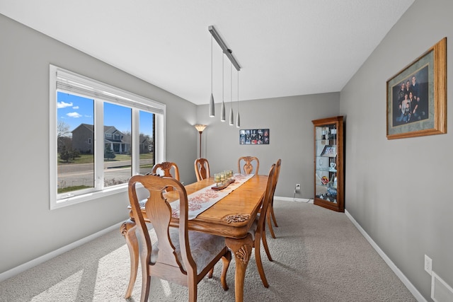 5214 381st Ln, North Branch, MN 55056 - dining area featuring visible vents, baseboards, and carpet floors