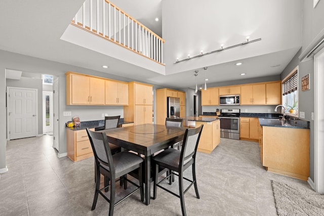 5214 381st Ln, North Branch, MN 55056 - dining area with recessed lighting, baseboards, and a high ceiling