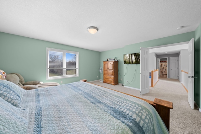 5214 381st Ln, North Branch, MN 55056 - carpeted bedroom with a textured ceiling and baseboards