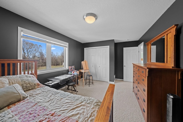 5214 381st Ln, North Branch, MN 55056 - bedroom featuring a textured ceiling, a closet, light carpet, and baseboards